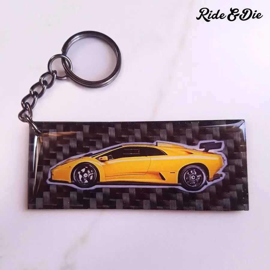 Amber Carbon-Look Racing Keyring · Tempo & Torque